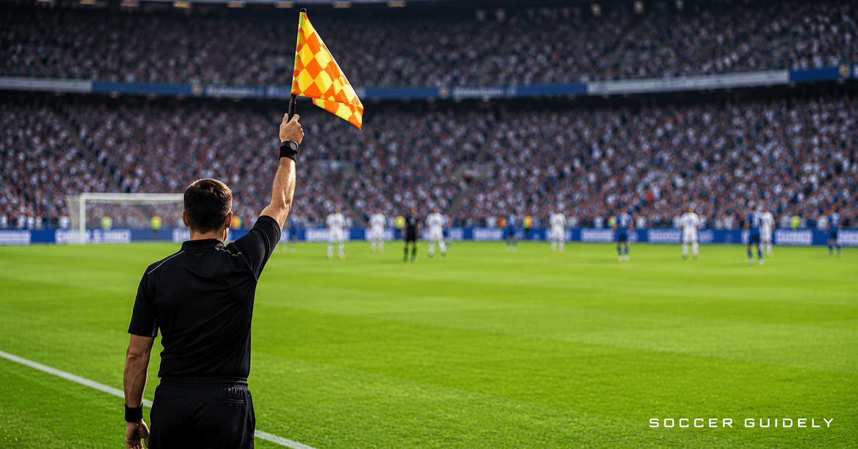 Assistant referee raising offside flag during a soccer match