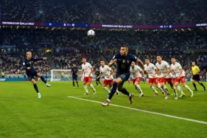 Attacking player sprinting past defenders, illustrating the offside vs onside comparison in soccer